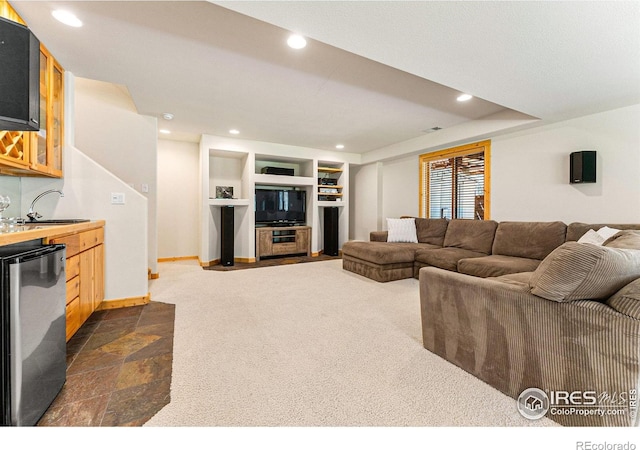 178 Hazelwood Dr, Nederland, CO 80466 - living area featuring recessed lighting, dark stone finish floors, and bar area