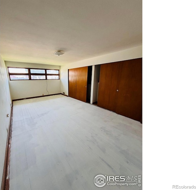 151 W 1st St N, Cheyenne Wells, CO 80810 - unfurnished bedroom featuring baseboards