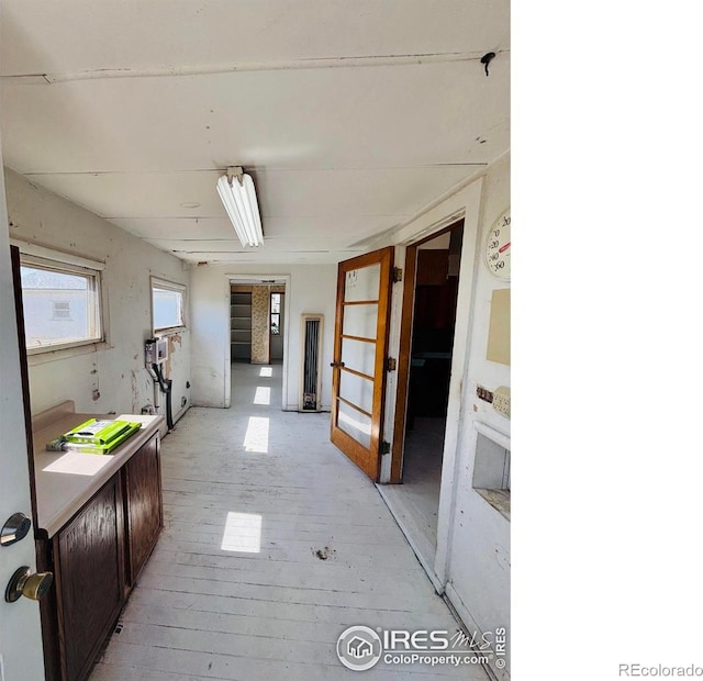 151 W 1st St N, Cheyenne Wells, CO 80810 - hall featuring light wood-style flooring