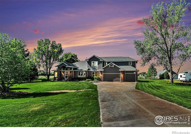 4615 Kitchell Way, Fort Collins, CO 80524 - traditional home featuring concrete driveway, a lawn, and an attached garage