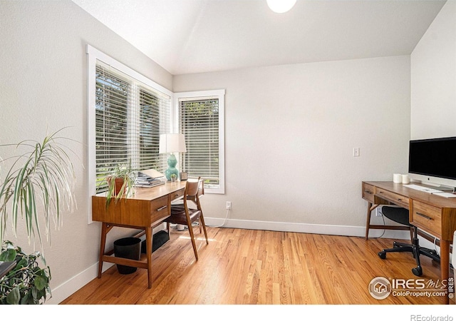 4615 Kitchell Way, Fort Collins, CO 80524 - home office with light wood-style floors and lofted ceiling