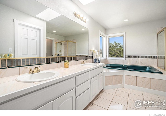 4615 Kitchell Way, Fort Collins, CO 80524 - full bathroom with a bath, double vanity, a stall shower, and recessed lighting