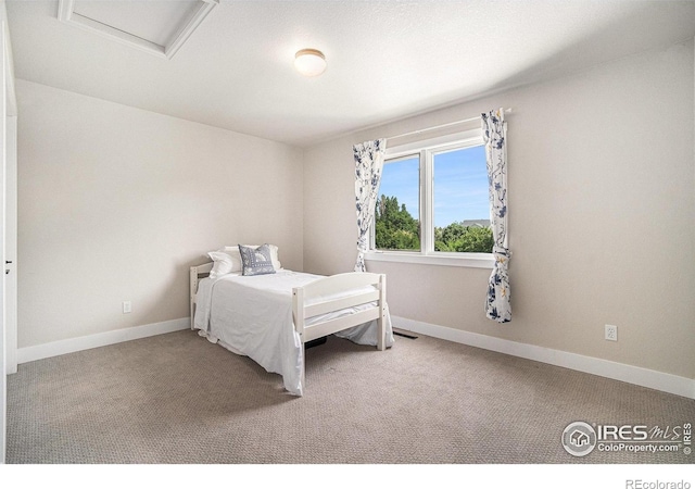 4615 Kitchell Way, Fort Collins, CO 80524 - carpeted bedroom featuring attic access and baseboards