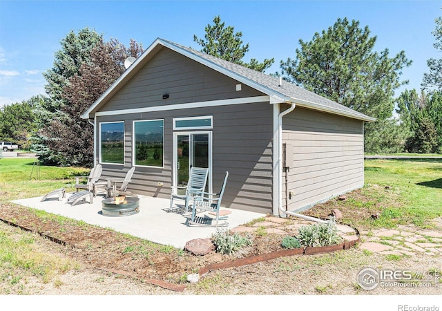 4615 Kitchell Way, Fort Collins, CO 80524 - rear view of house with a patio and a lawn