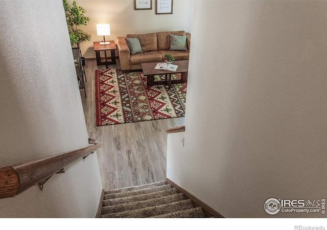 425 Walden Way, Fort Collins, CO 80526 - stairway with wood finished floors