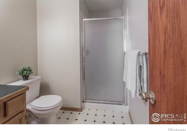 425 Walden Way, Fort Collins, CO 80526 - bathroom featuring a stall shower, tile patterned floors, and vanity