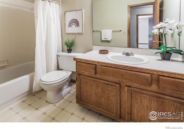 425 Walden Way, Fort Collins, CO 80526 - bathroom featuring vanity, shower / bath combo with shower curtain, and tile patterned floors