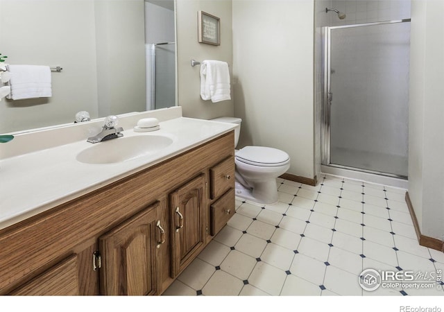 425 Walden Way, Fort Collins, CO 80526 - bathroom featuring tile patterned floors, vanity, and a shower stall