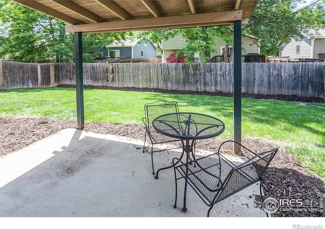 425 Walden Way, Fort Collins, CO 80526 - fenced backyard with a patio