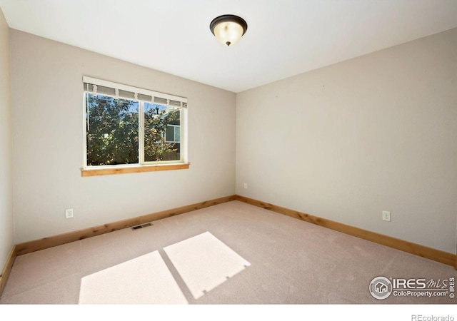 333 Braveheart Ln, Johnstown, CO 80534 - carpeted empty room with baseboards