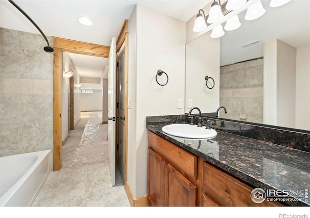 333 Braveheart Ln, Johnstown, CO 80534 - full bathroom featuring vanity and  shower combination