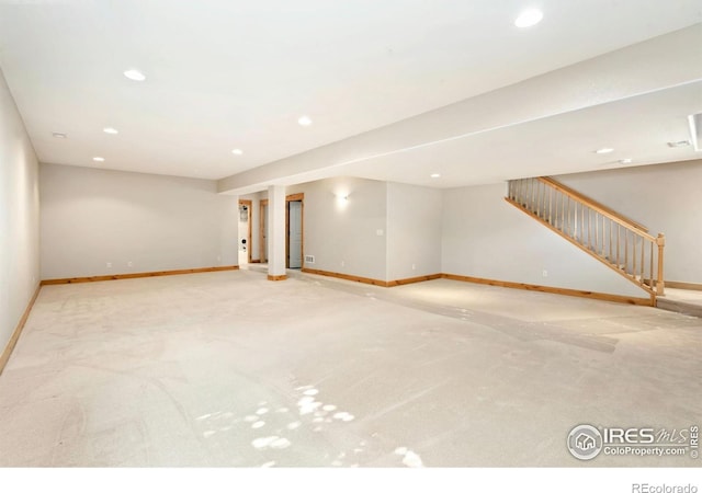 333 Braveheart Ln, Johnstown, CO 80534 - unfurnished living room with carpet floors, stairway, and recessed lighting