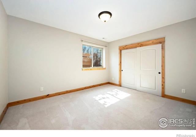 333 Braveheart Ln, Johnstown, CO 80534 - unfurnished bedroom featuring carpet and a closet