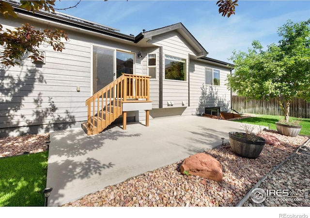 333 Braveheart Ln, Johnstown, CO 80534 - rear view of house with a patio