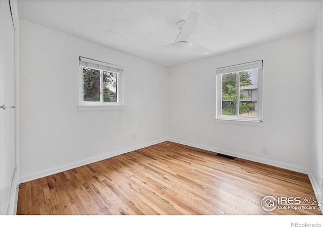 6755 W 33rd Ave, Wheat Ridge, CO 80033 - unfurnished room with wood finished floors and ceiling fan