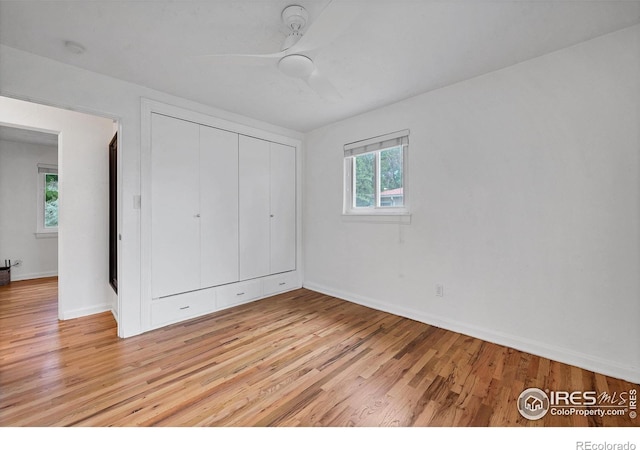 6755 W 33rd Ave, Wheat Ridge, CO 80033 - unfurnished bedroom featuring light wood-type flooring, a closet, and a ceiling fan