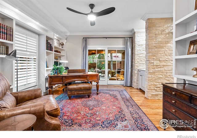 3000 E Cedar Ave Unit 2, Denver, CO 80209 - office area featuring ceiling fan, light wood finished floors, ornamental molding, and built in shelves