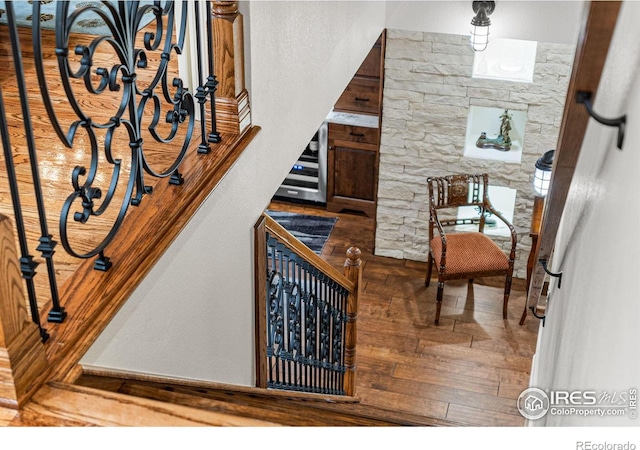 3000 E Cedar Ave Unit 2, Denver, CO 80209 - stairs with hardwood / wood-style flooring