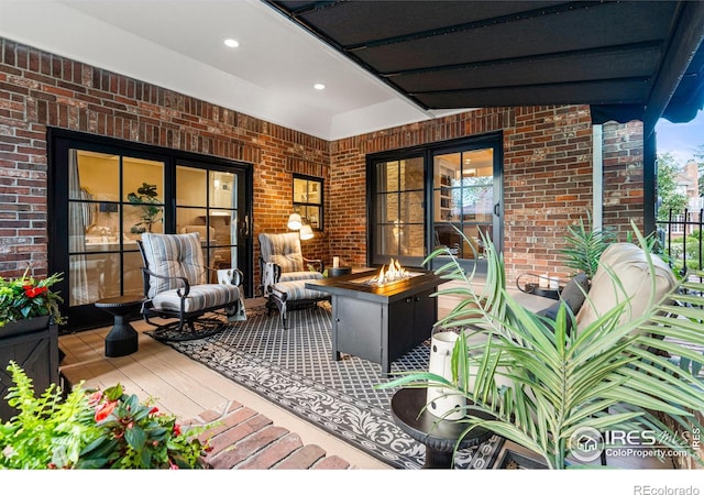 3000 E Cedar Ave Unit 2, Denver, CO 80209 - wooden deck with a fire pit