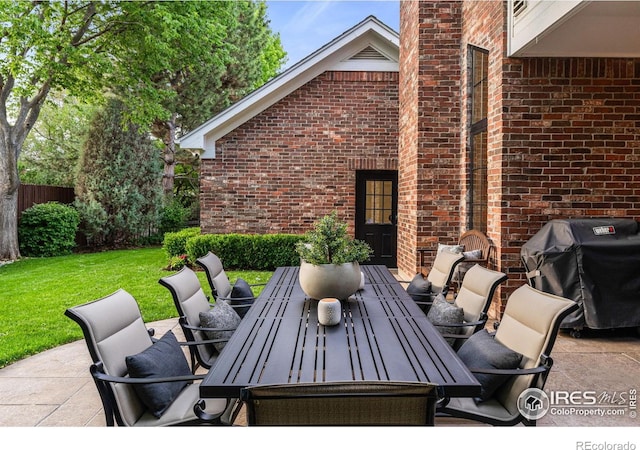 3000 E Cedar Ave Unit 2, Denver, CO 80209 - view of patio featuring outdoor dining space and area for grilling