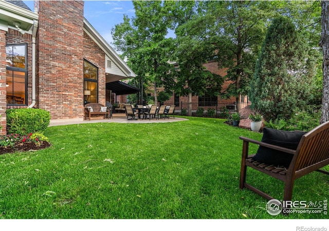 3000 E Cedar Ave Unit 2, Denver, CO 80209 - view of yard featuring a patio area
