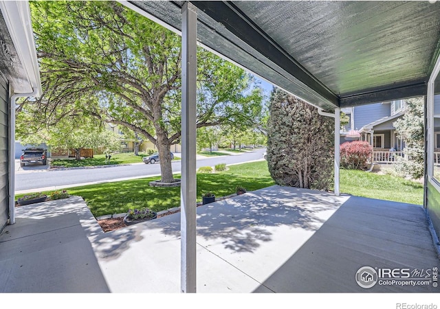 5491 E 117th Ave, Thornton, CO 80233 - covered porch with a yard