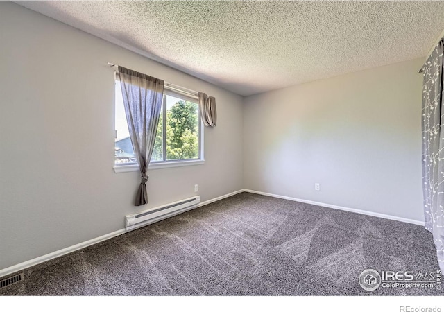 5491 E 117th Ave, Thornton, CO 80233 - empty room featuring a baseboard heating unit, carpet, and a textured ceiling
