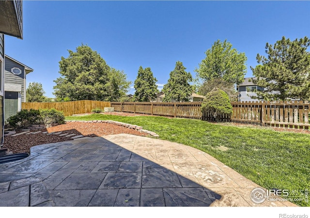 5491 E 117th Ave, Thornton, CO 80233 - fenced backyard featuring a patio