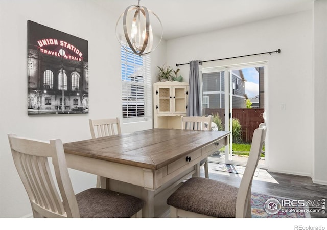 1781 Summer Bloom Dr, Windsor, CO 80550 - dining space featuring healthy amount of natural light and wood finished floors