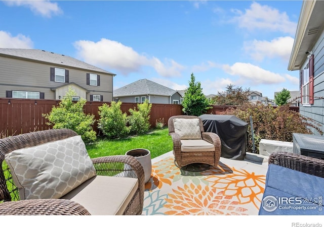 1781 Summer Bloom Dr, Windsor, CO 80550 - fenced backyard featuring area for grilling and a patio area