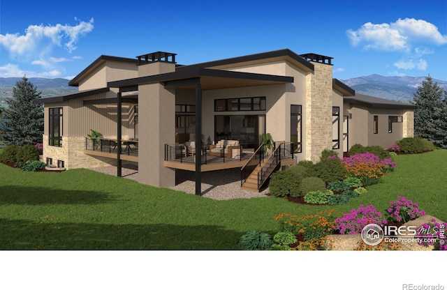 2669 Southwind Dr, Berthoud, CO 80513 - rear view of property with a mountain view, stucco siding, a patio, and stone siding