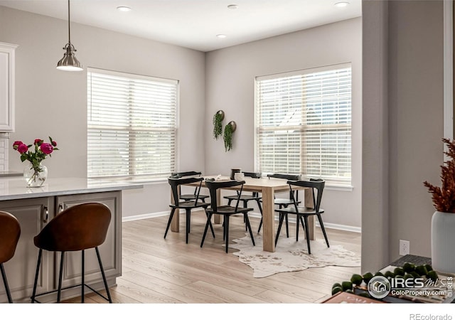 1389 Lyons Ln, Erie, CO 80516 - dining area featuring light wood-style flooring and recessed lighting