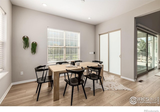 1389 Lyons Ln, Erie, CO 80516 - dining space with light wood-style flooring and recessed lighting