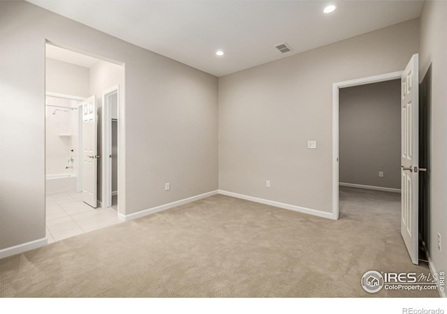 1389 Lyons Ln, Erie, CO 80516 - unfurnished room with light carpet and recessed lighting