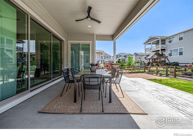 1389 Lyons Ln, Erie, CO 80516 - view of patio featuring a ceiling fan, a residential view, and outdoor dining space