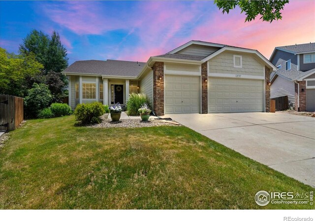 2707 Pochard Ct, Johnstown, CO 80534 - view of front of property with an attached garage and driveway