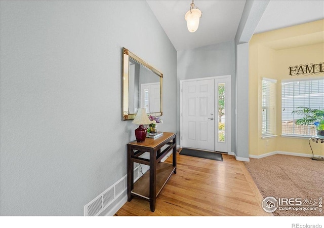 2707 Pochard Ct, Johnstown, CO 80534 - entryway with baseboards and light wood-style flooring