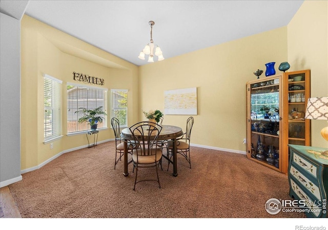 2707 Pochard Ct, Johnstown, CO 80534 - dining room featuring a chandelier and carpet