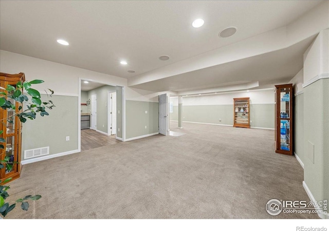 2707 Pochard Ct, Johnstown, CO 80534 - finished basement with carpet floors and recessed lighting