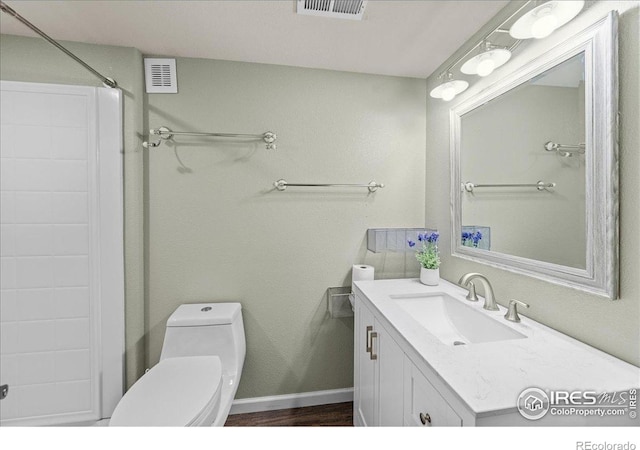 2707 Pochard Ct, Johnstown, CO 80534 - bathroom featuring vanity, a shower, and wood finished floors