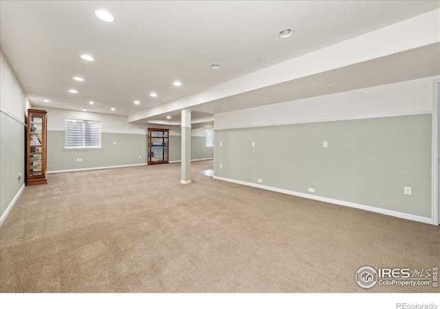 2707 Pochard Ct, Johnstown, CO 80534 - below grade area featuring light colored carpet and recessed lighting