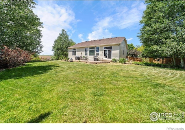 2707 Pochard Ct, Johnstown, CO 80534 - rear view of property featuring a patio area