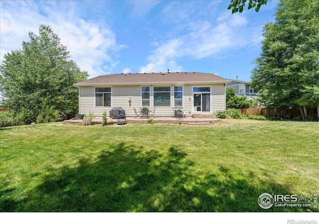2707 Pochard Ct, Johnstown, CO 80534 - back of property featuring a patio