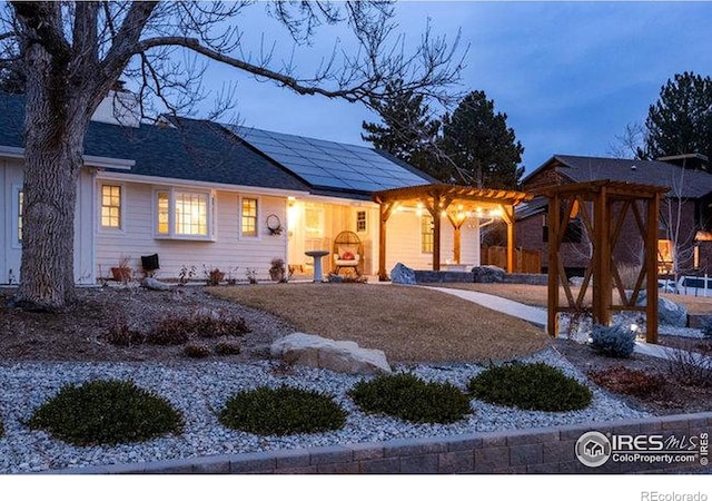 14117 W 58th Pl, Arvada, CO 80004 - ranch-style house featuring roof mounted solar panels