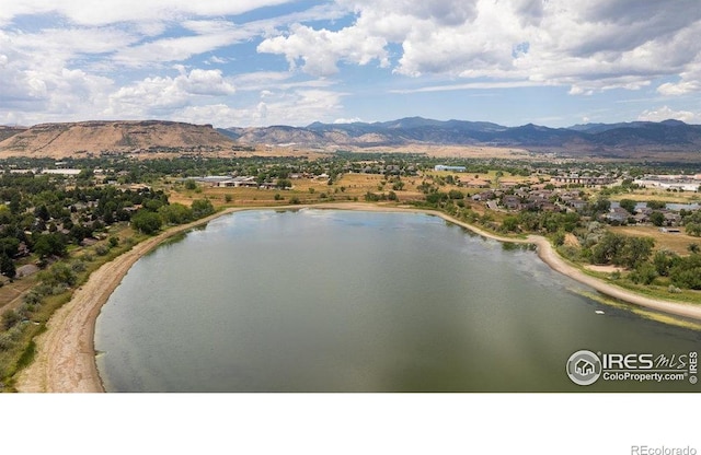 14117 W 58th Pl, Arvada, CO 80004 - drone / aerial view of a water and mountain view