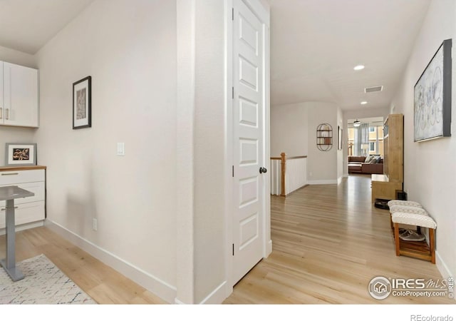 2156 Setting Sun Dr, Windsor, CO 80550 - corridor with light wood-type flooring and recessed lighting