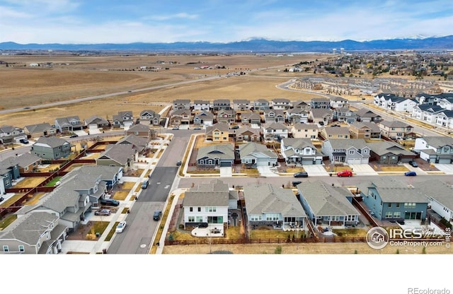 2156 Setting Sun Dr, Windsor, CO 80550 - aerial view of residential area with a mountainous background