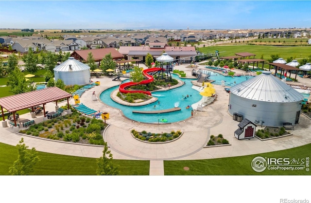 2156 Setting Sun Dr, Windsor, CO 80550 - aerial view of residential area with a pool