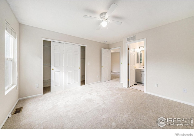 3314 Planter Way, Fort Collins, CO 80526 - unfurnished bedroom with carpet flooring, a closet, ensuite bath, and a ceiling fan