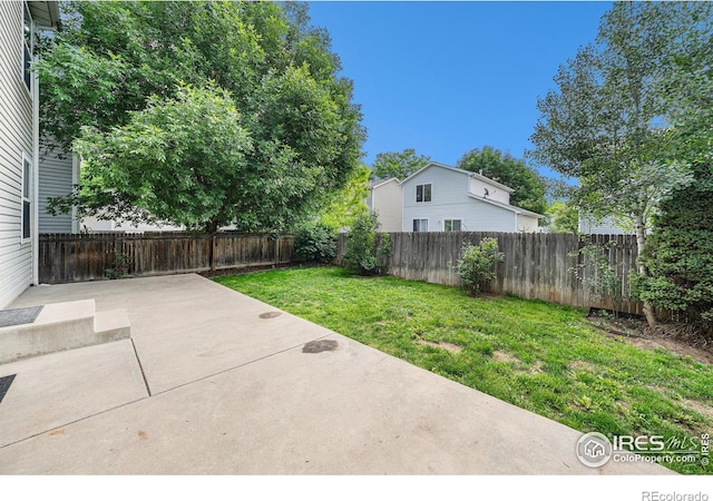 3314 Planter Way, Fort Collins, CO 80526 - fenced backyard with a patio area